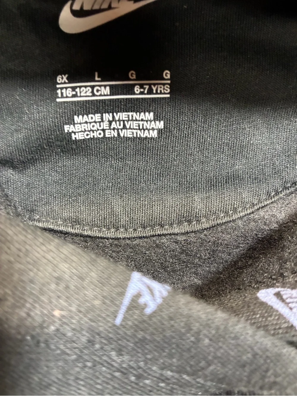 Nike Allover Futura Logo Hoodie for kids in size 6X (6–7 years)